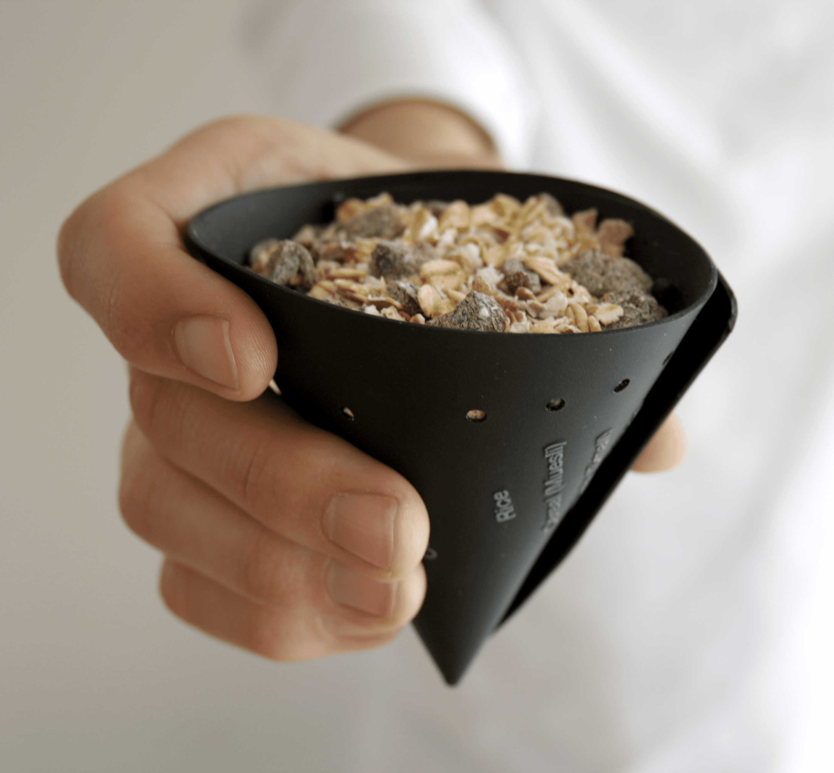 The Divide Equally cone by Rodd is a great way to easily measure a healthy portion of dry ingredients during food preparation