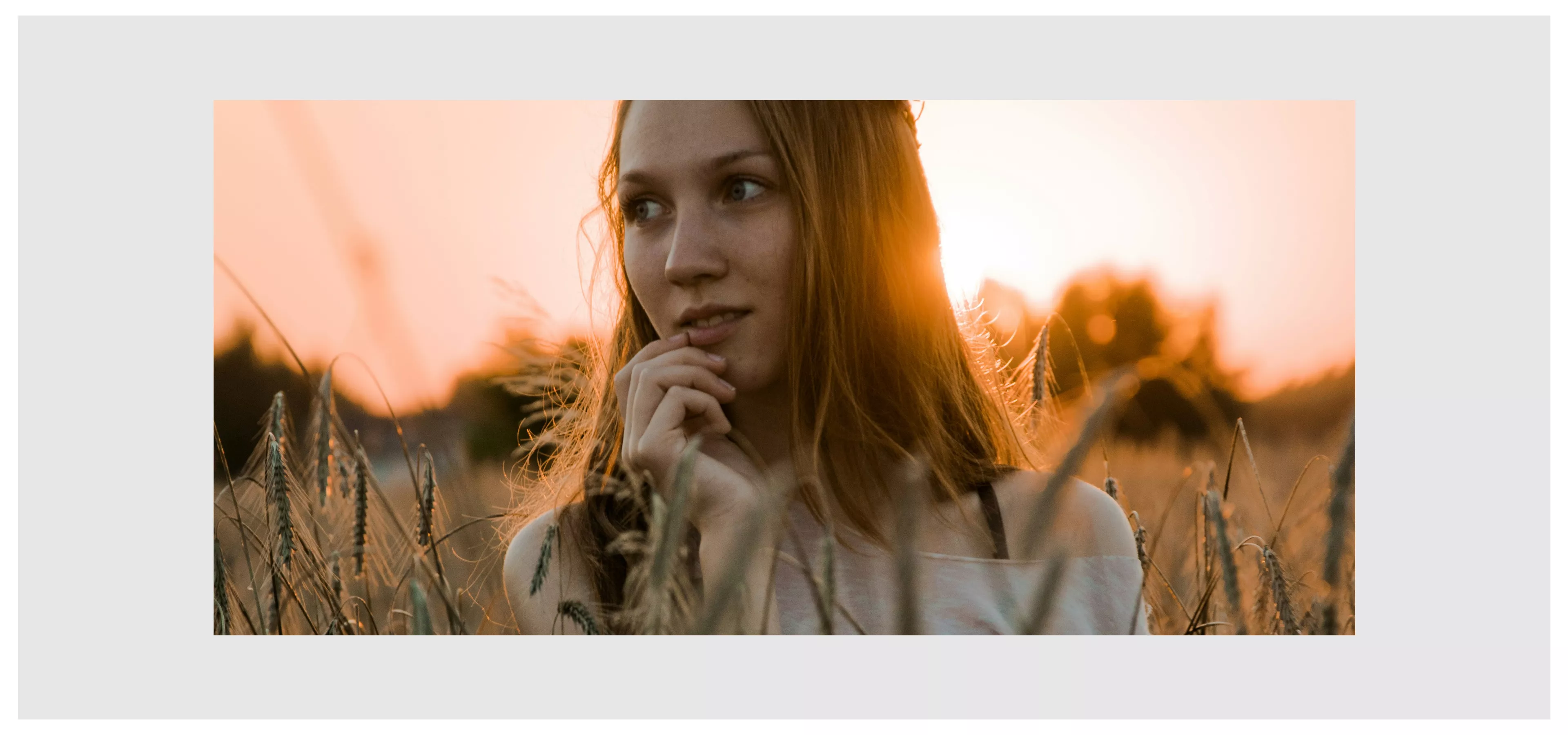 Health and lifestyle influencer in a field at golden hour