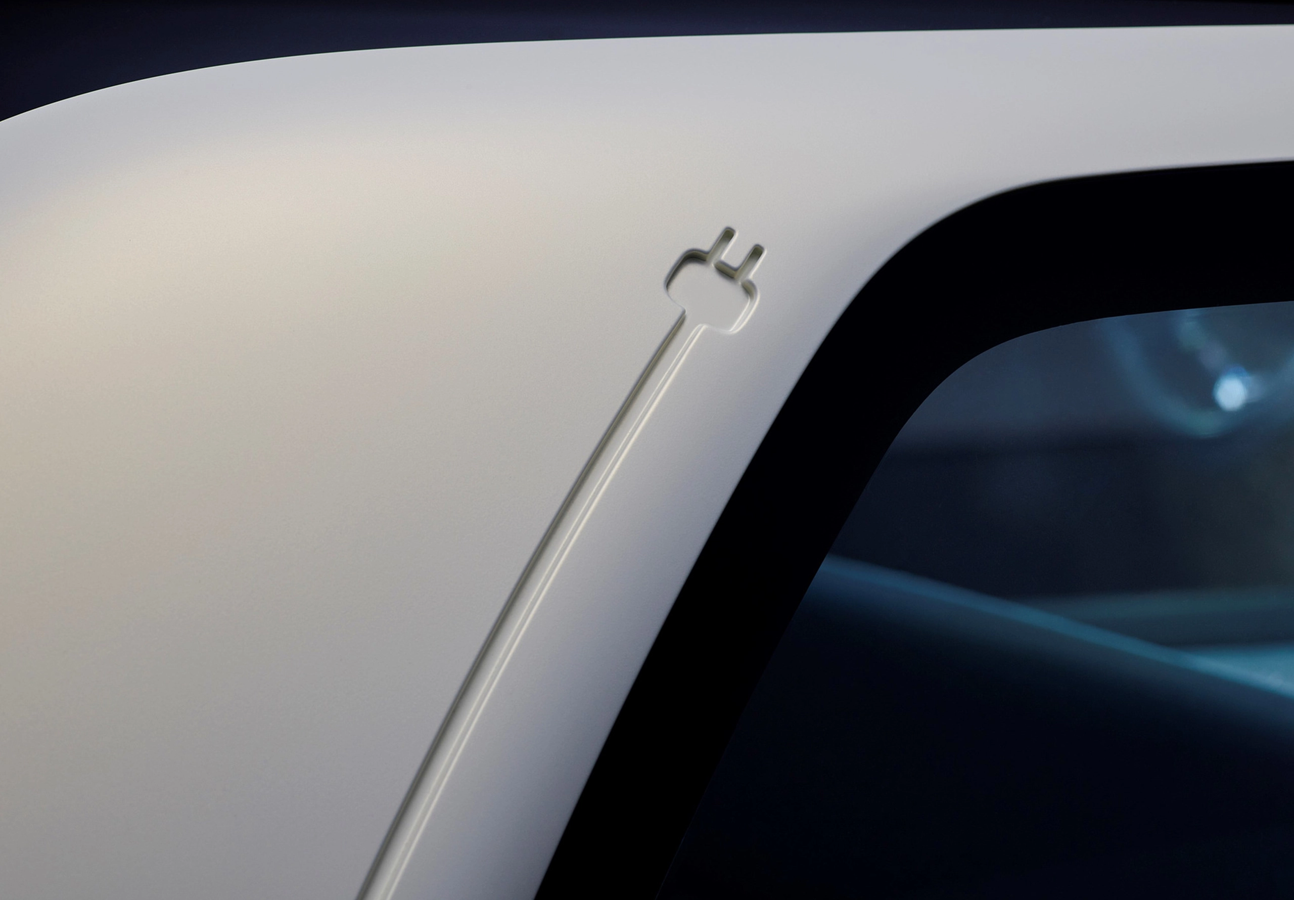 Closeup detail of a white electric car