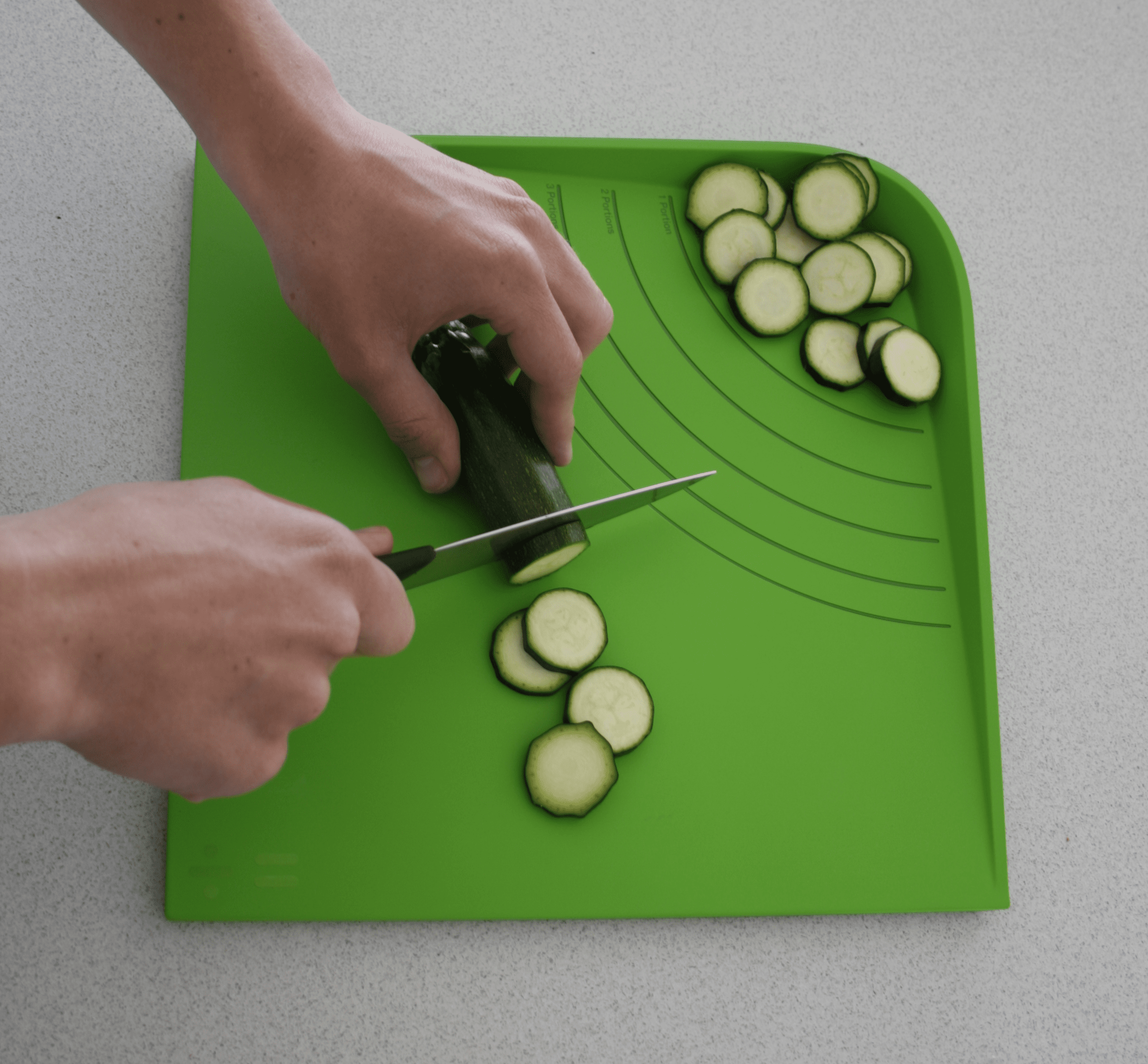 divide equally chopping board being used to measure the correct portion of vegetables