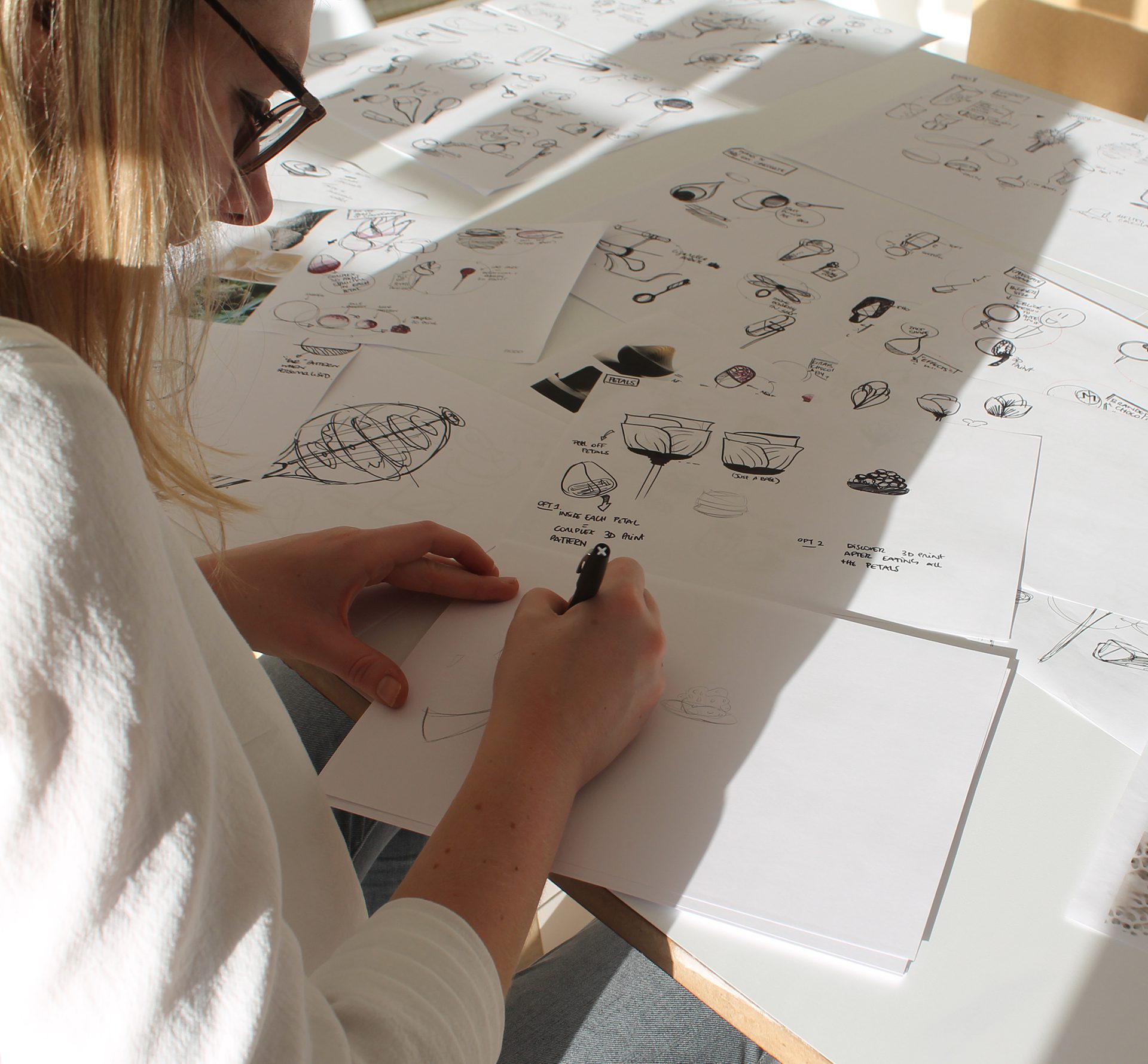 Bea, a designer at Rodd sketching concepts