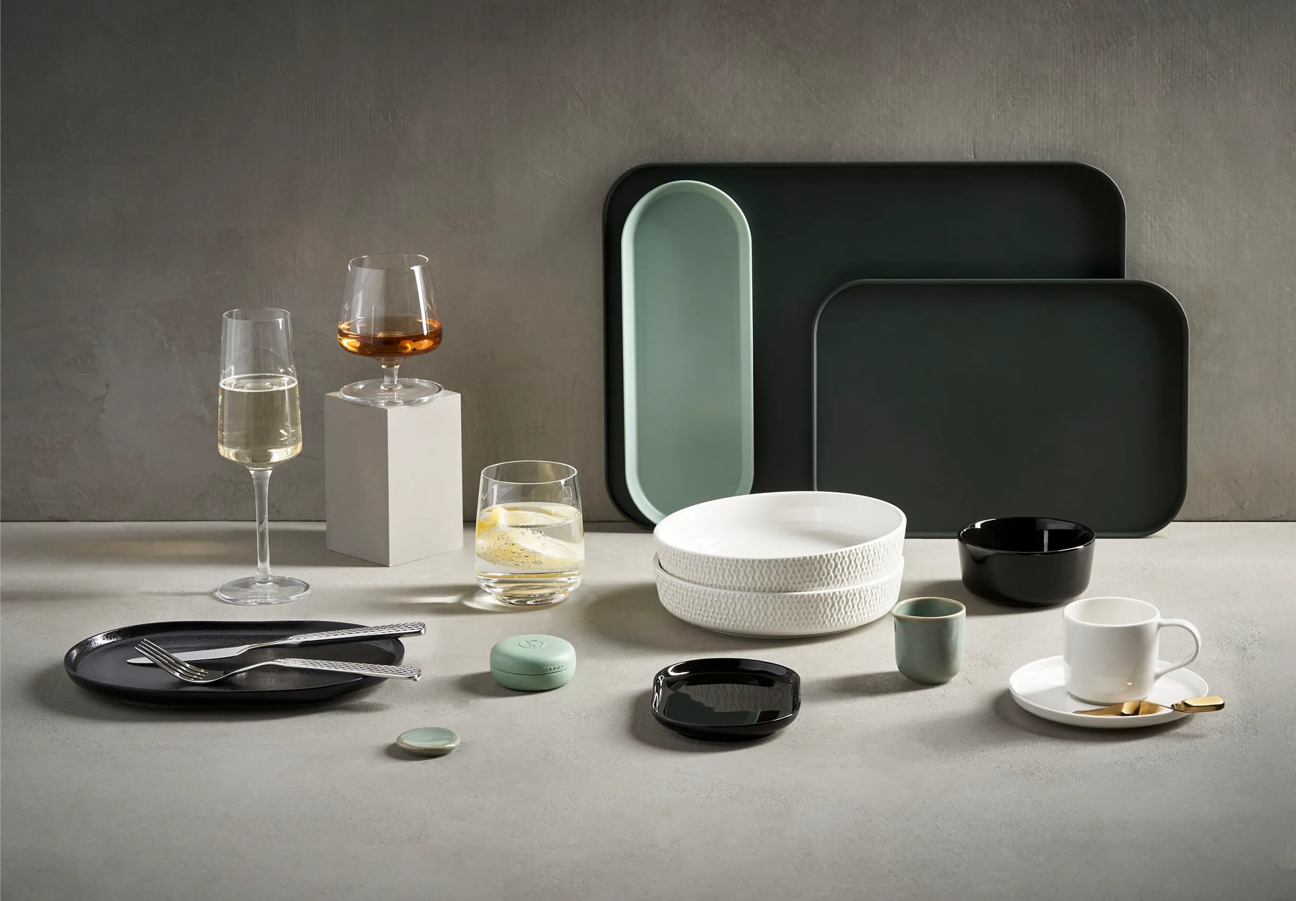 a collection of table ware by Etihad