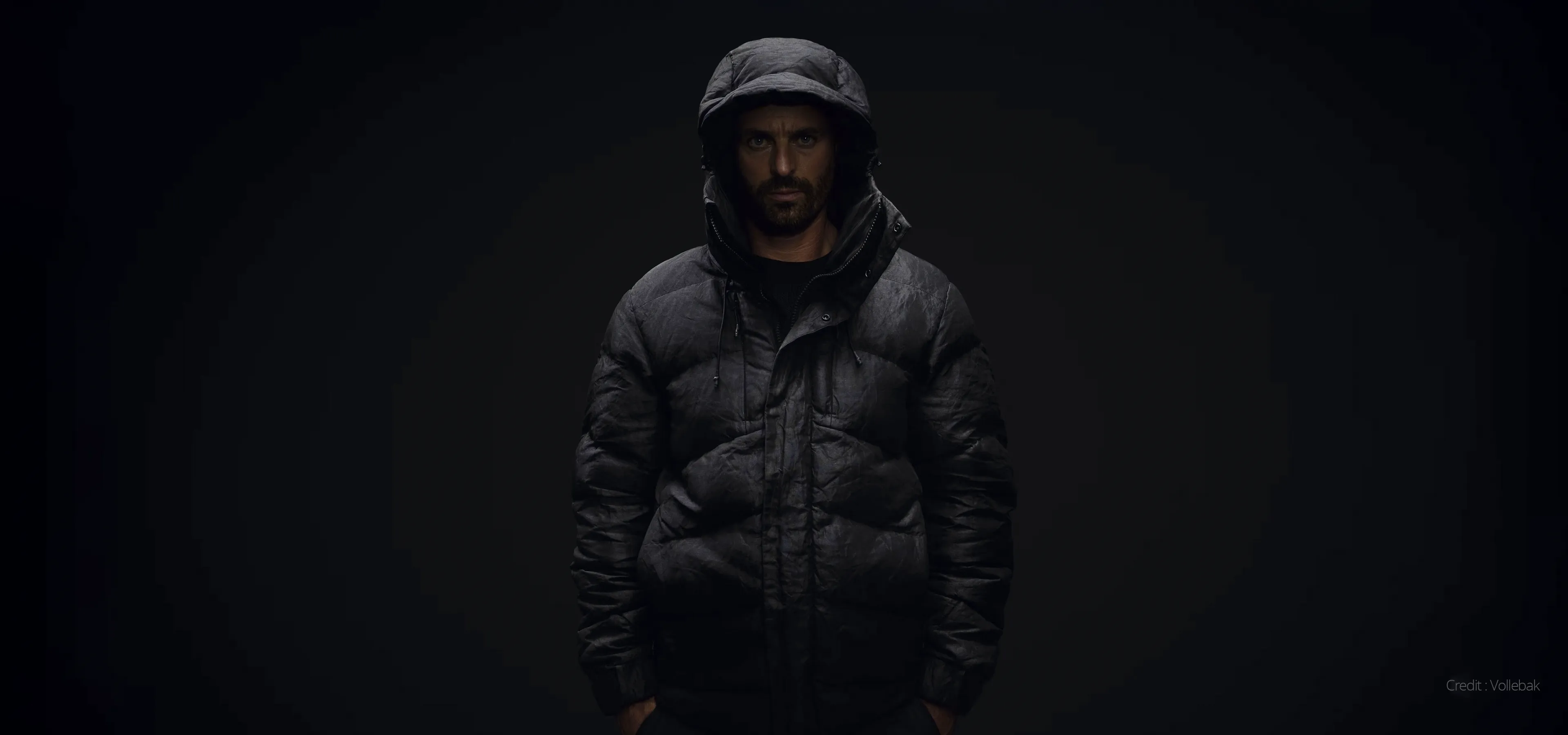 Man wearing a black indestructible puffer jacket