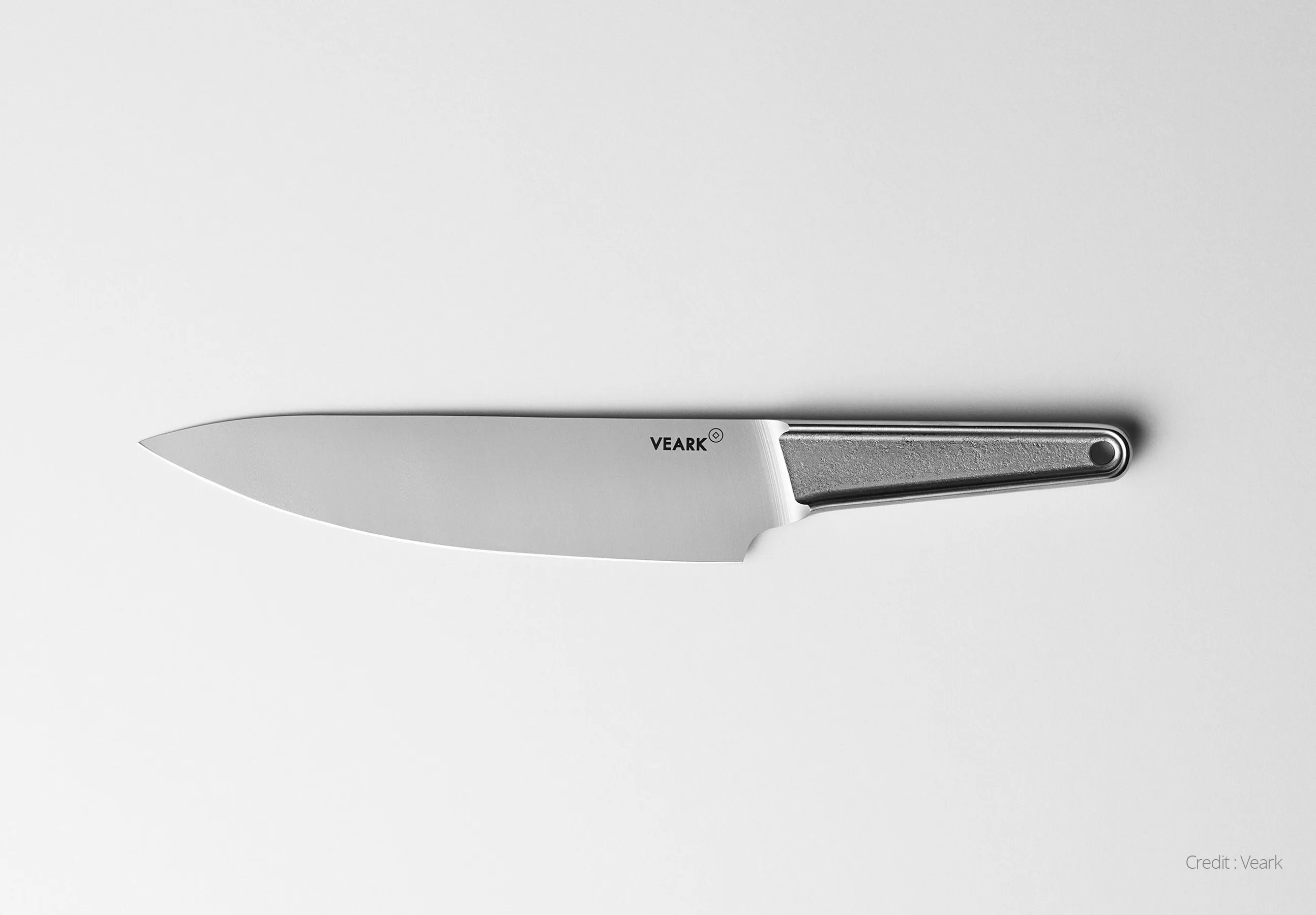 Veark forged knife on a grey background