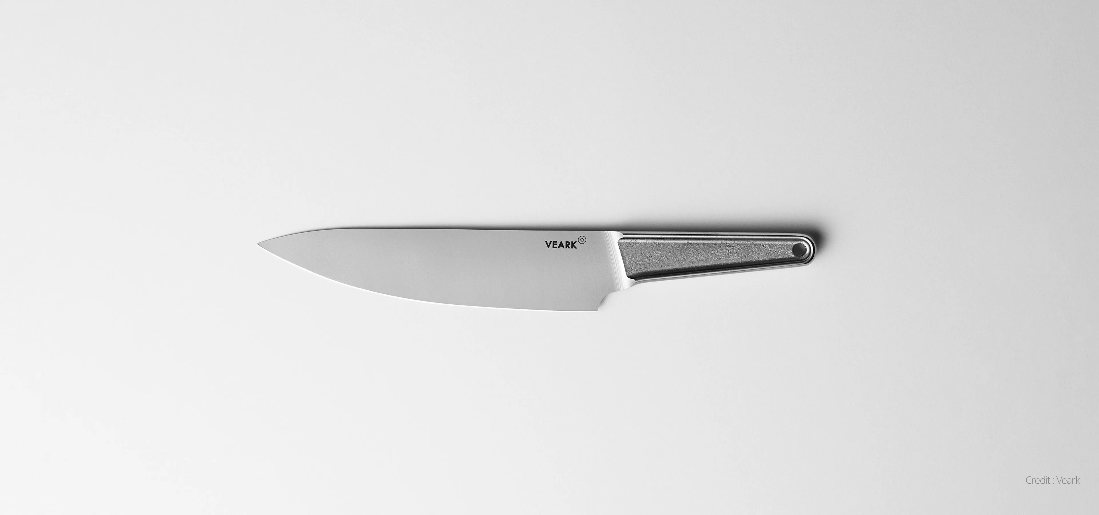Veark forged knife on a grey background
