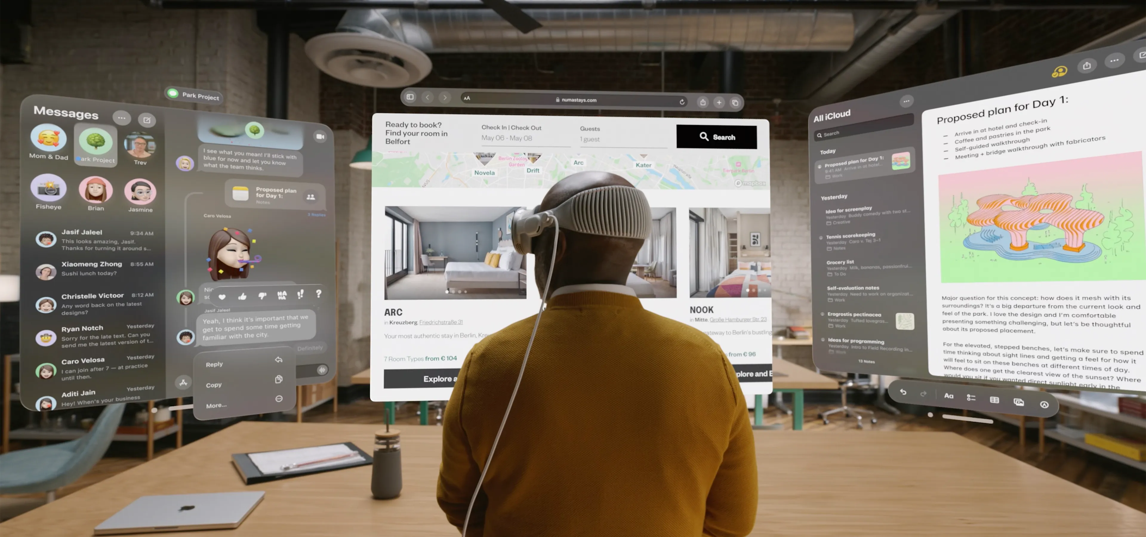 Man using multiple screens on an apple vision pro