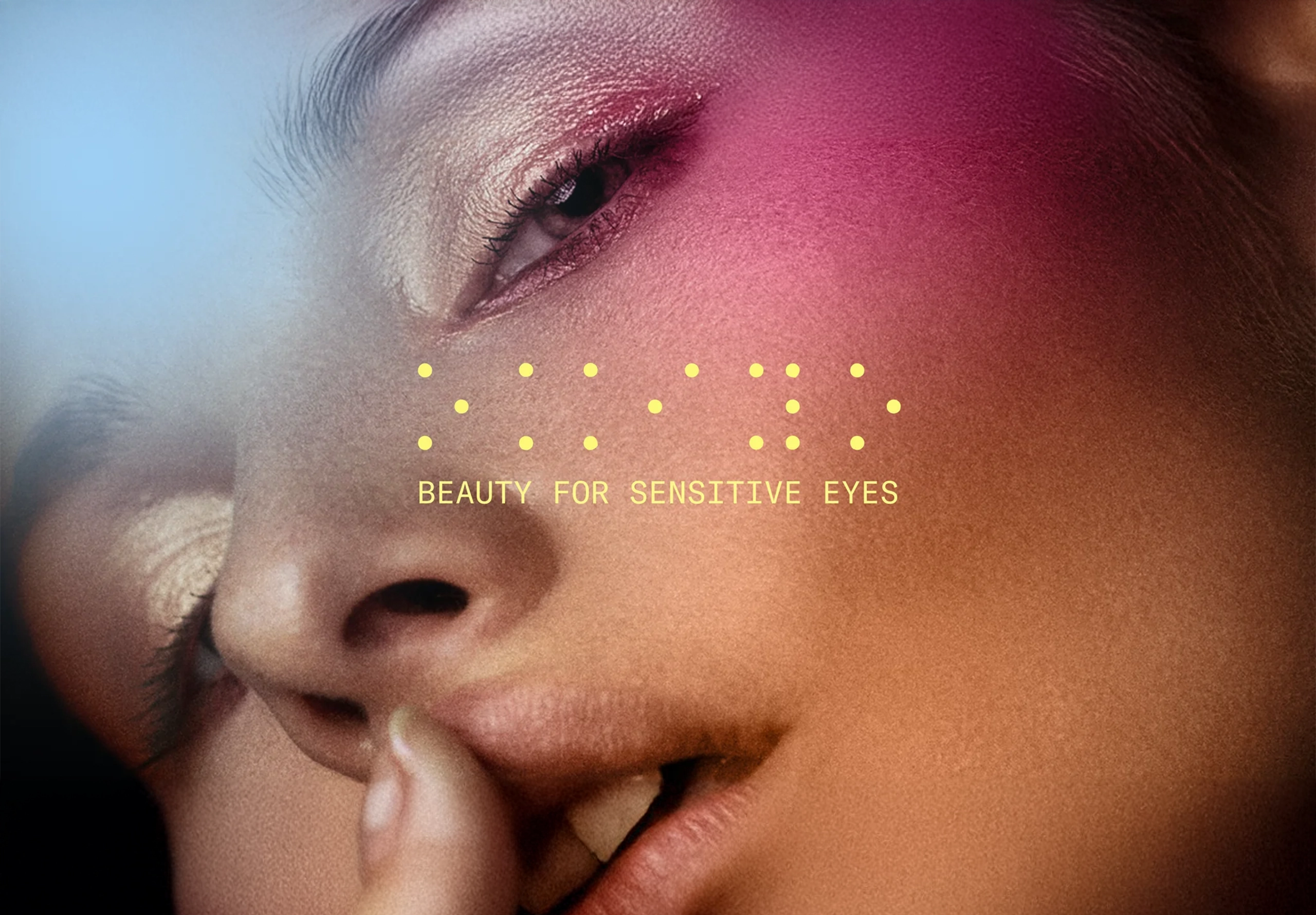 Woman with blue and pink lights on her face