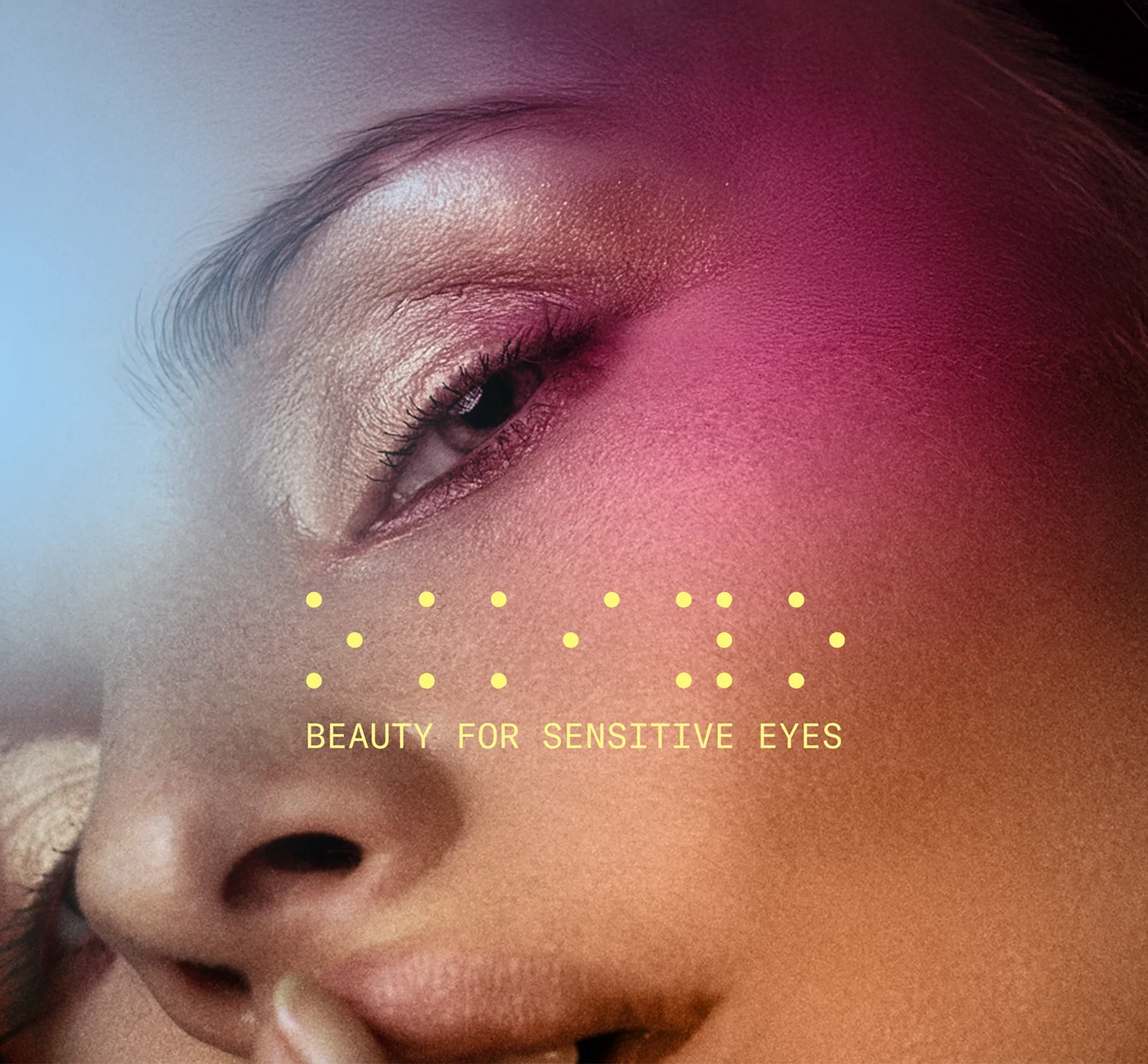 Woman with blue and pink lights on her face