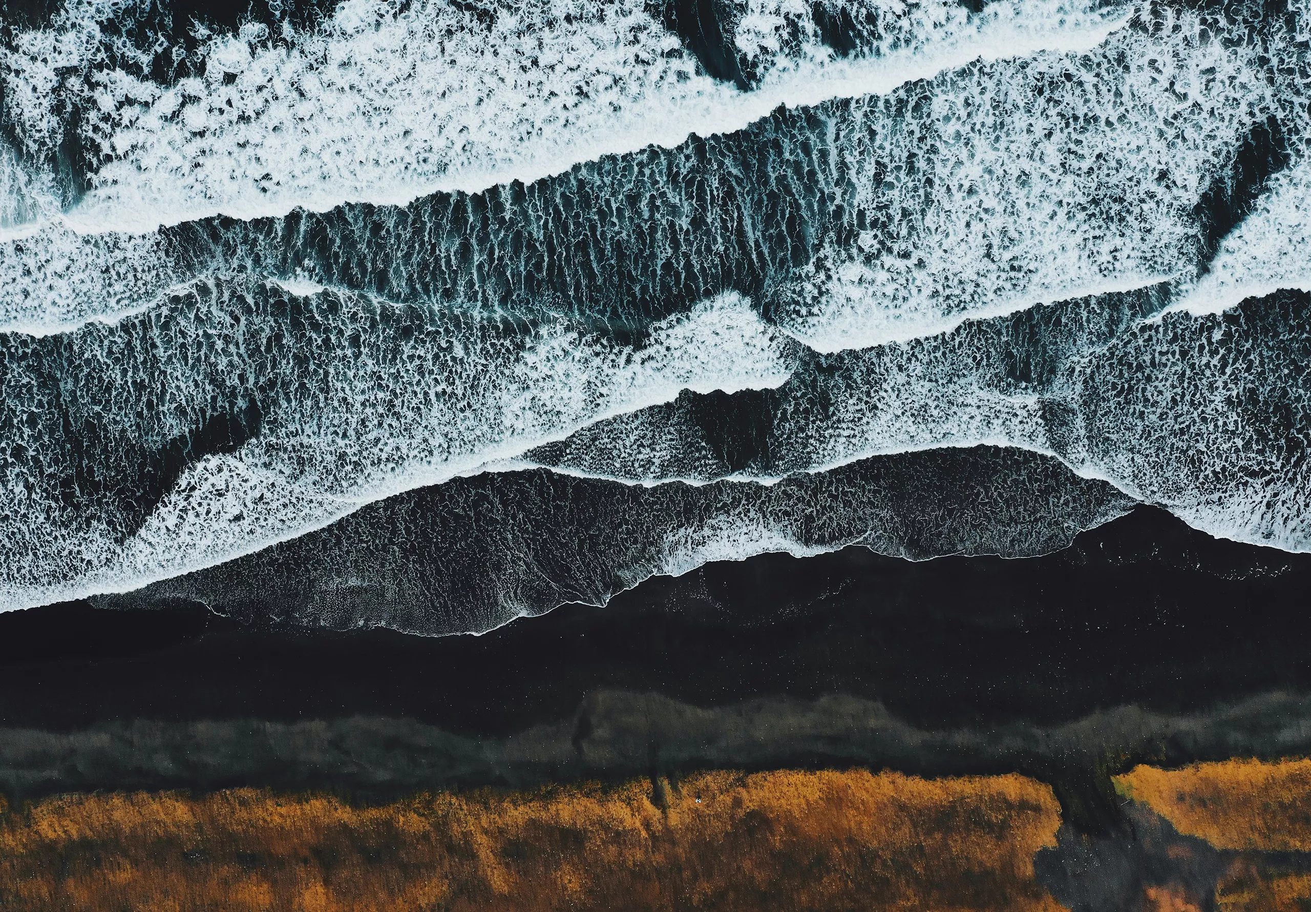 Waves breaking on an Icelandic beach