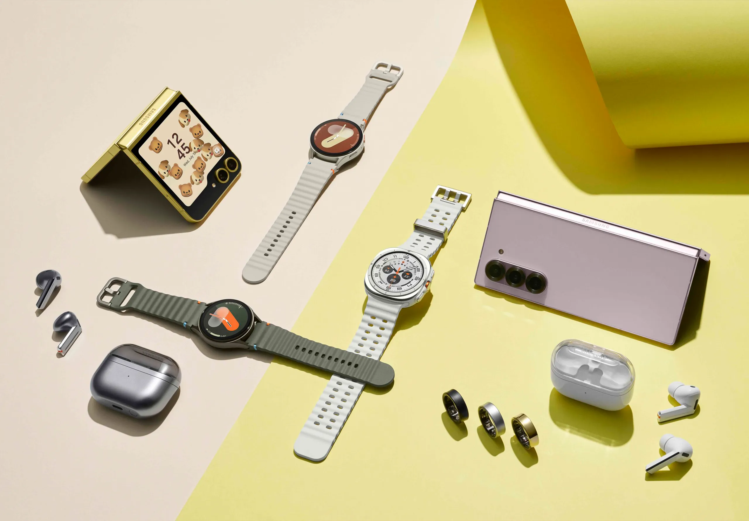 A selection of Samsung galaxy products on a pink and yellow background