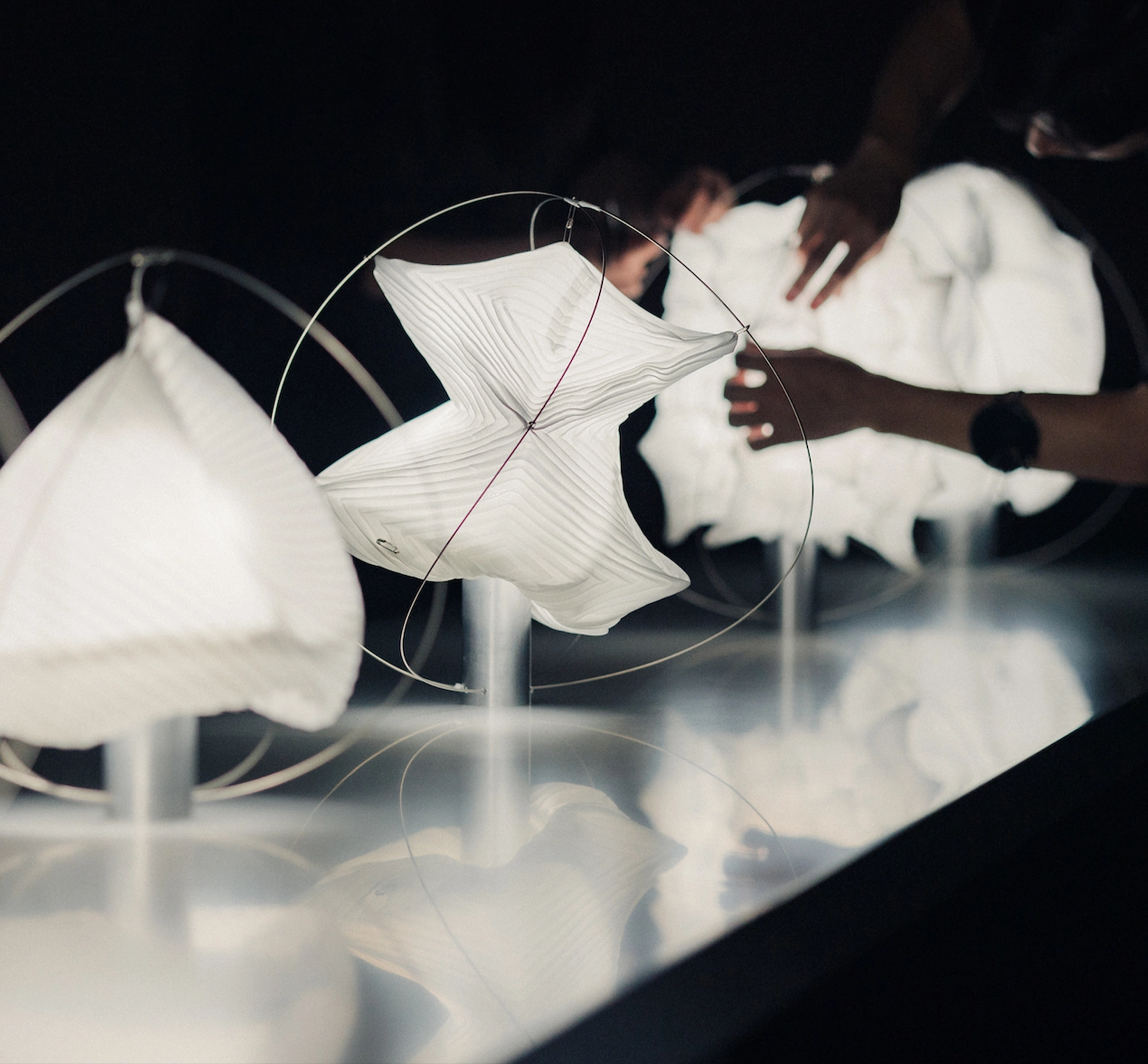 White cloth sculptural objects in an exhibition