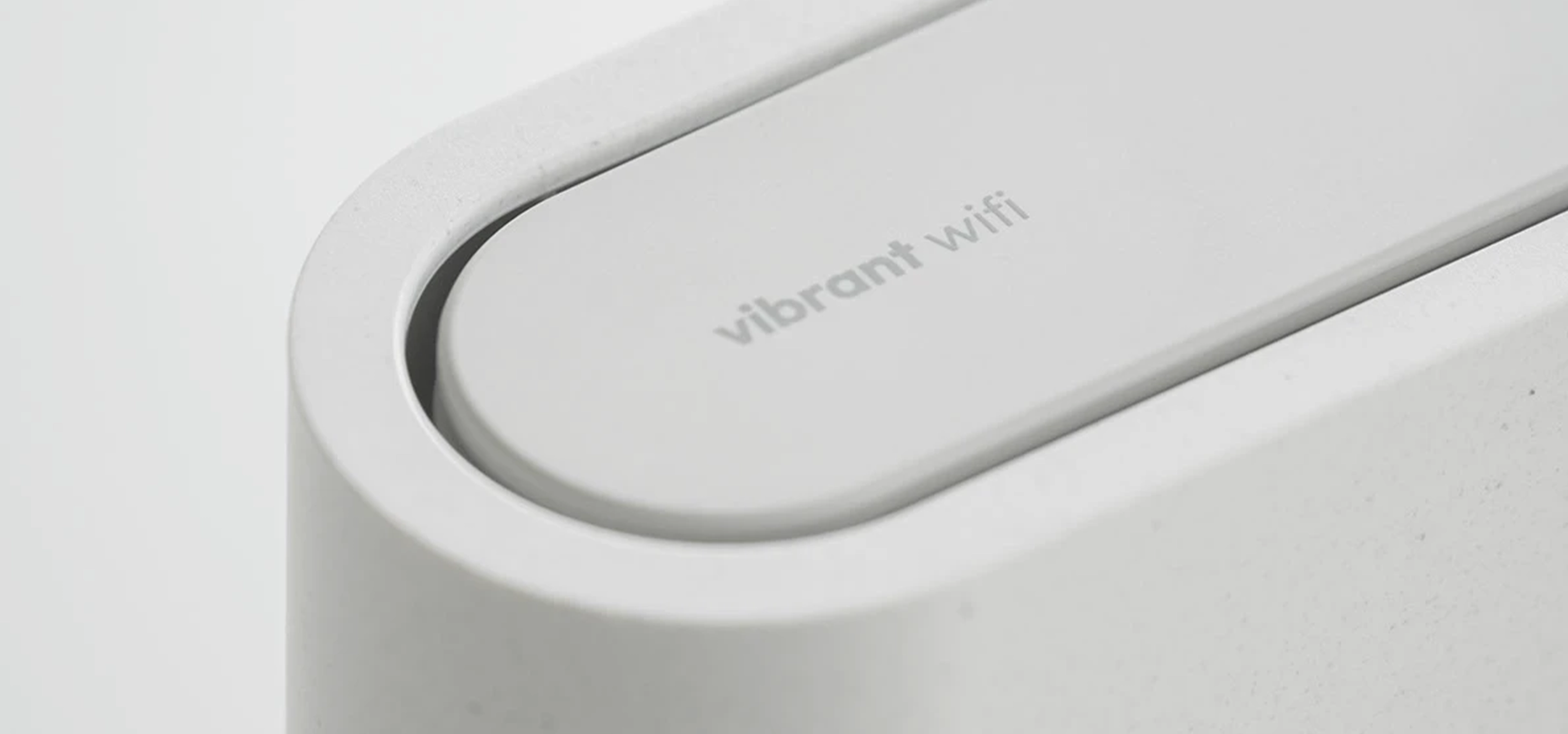 Closeup detail of a light grey wifi router