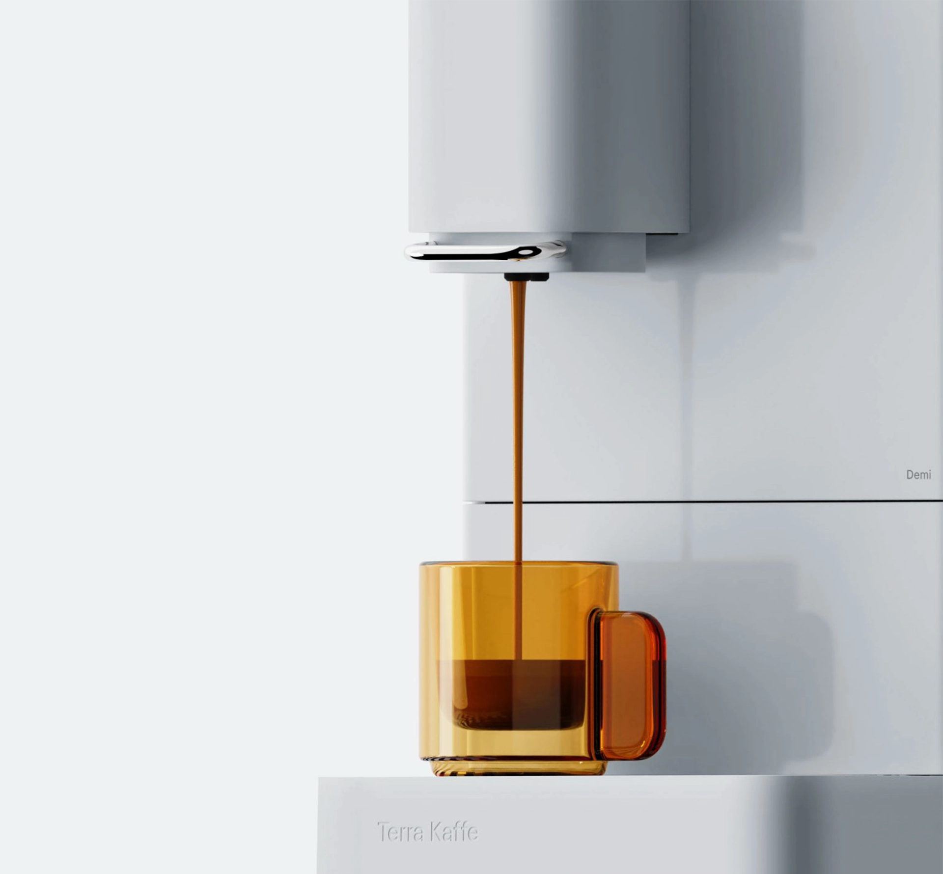 closeup of white espresso machine filling a cup with coffee