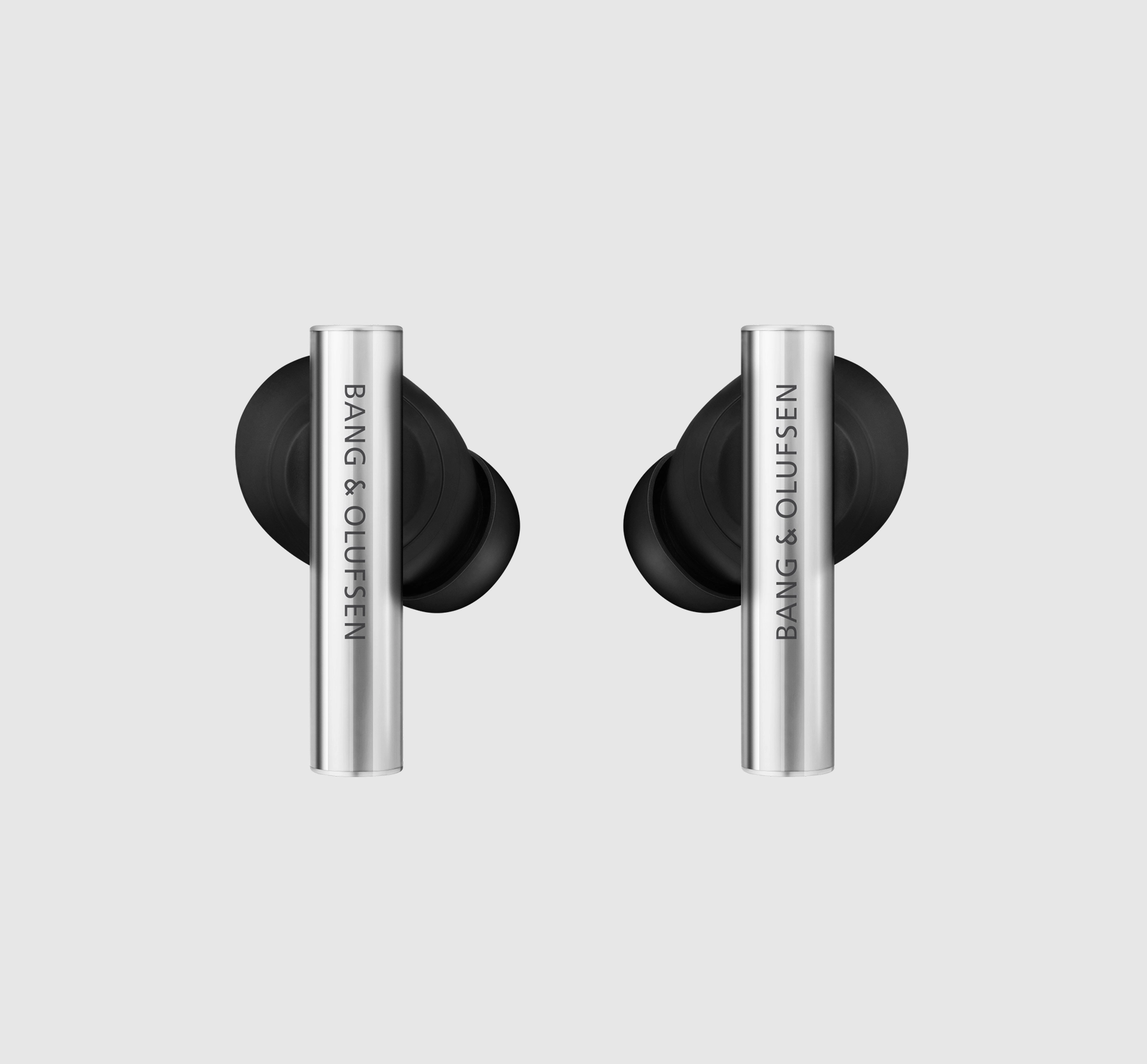 Silver and black B&O earphones