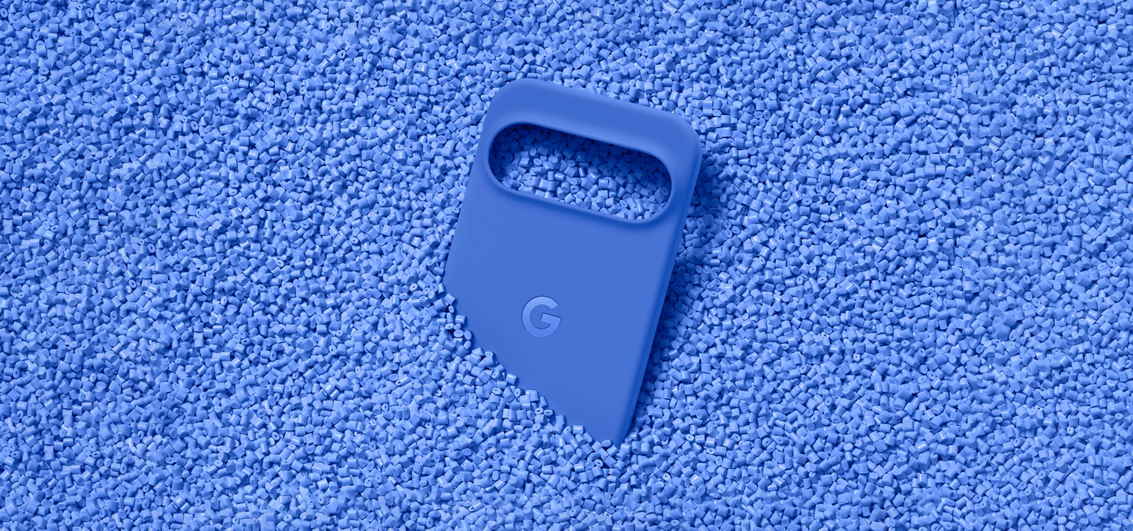 Part of a google phone in blue plastic pellets
