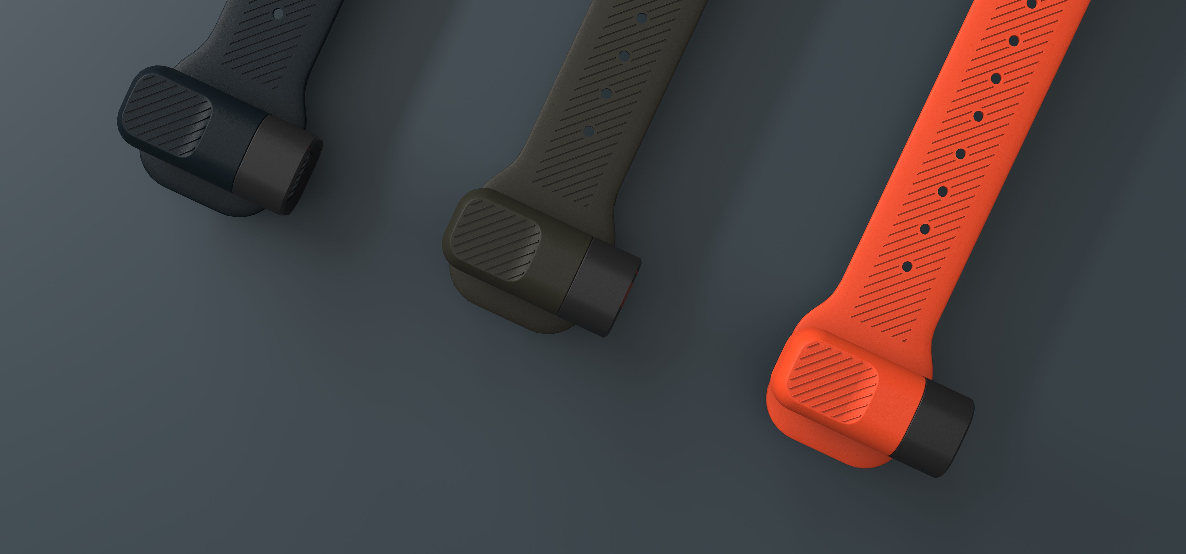 This is an image of a piece of industrial design. The product is called Alva a wearble torch. The image shows three torches arranged in a typical industrial design render, of a diagonal flatlay. The colour, material and finish is slate blue, heath green and bright orange.