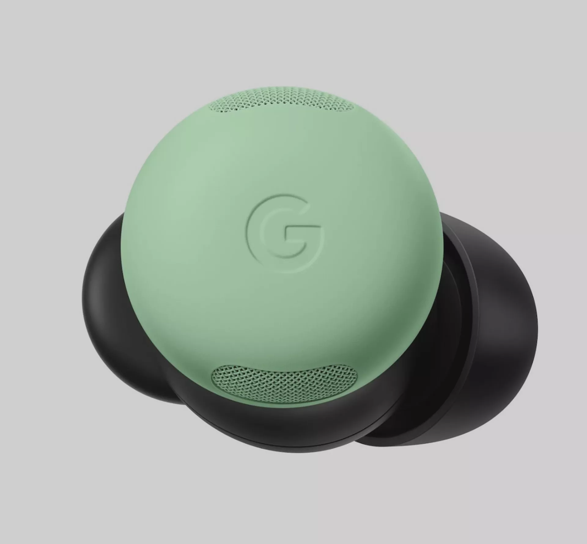Image shows a Google Pixel ear bud in black and pale green as an example of mono-material design.